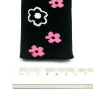 OPASKA ELASTYCZNA CZARNA Z KWIATKAMI                                                      (OPEL-5 sh) - 2