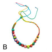 BRANSOLETKI NA SZNURKU Z KORALIKAMI 7 SZTUK                                             1814-2 AS - 3