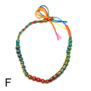 BRANSOLETKI NA SZNURKU Z KORALIKAMI 7 SZTUK                                             1814-2 AS - 7