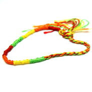 BRANSOLETKI NA SZNURKU Z KORALIKAMI 7 SZTUK                                             1814-2 AS - 15