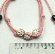 BRANSOLETKA  Z OZDOBNYMI KULKAMI                                                                        0615-205                                                                                   - 2